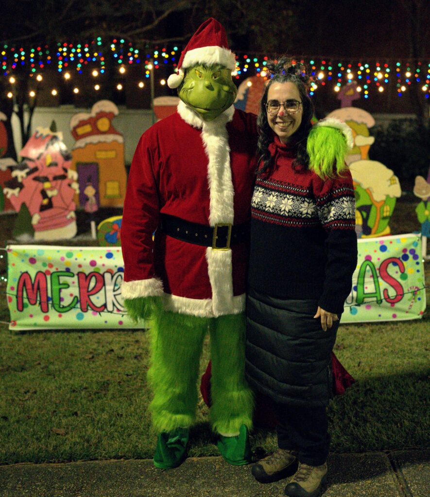Who hair and makeup done for meeting the Grinch.