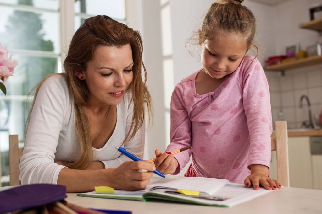mother and daughter look at list