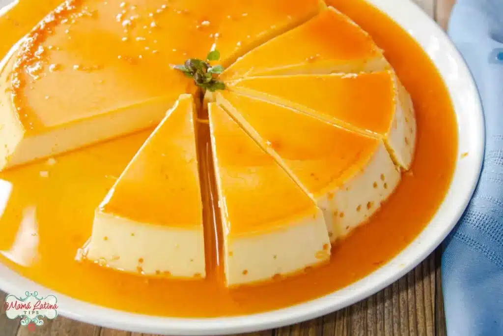 A sliced creme caramel on a plate.