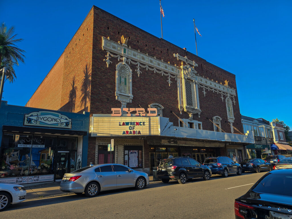 Historic Byrd Theatre in Richmond’s Carytown neighborhood, with its illuminated marquee advertising Lawrence of Arabia.